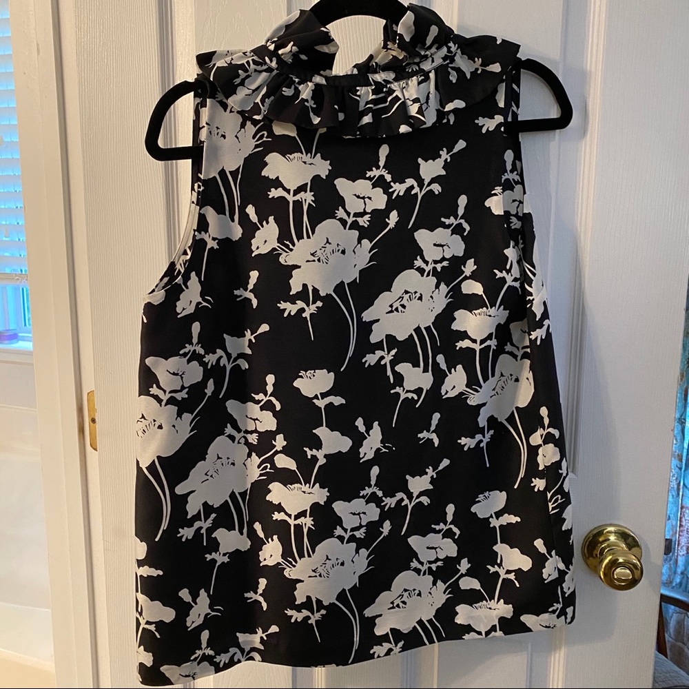 Sleeveless Black and Floral White Blouse